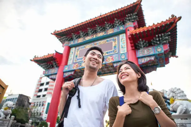 Two students in china happy who learn Chinese in china with a Chinese background