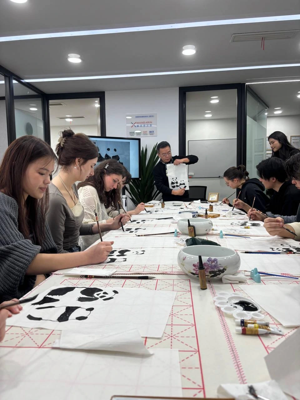 Panda painting Chinese brush art cultural workshop Chengdu au pair Masons