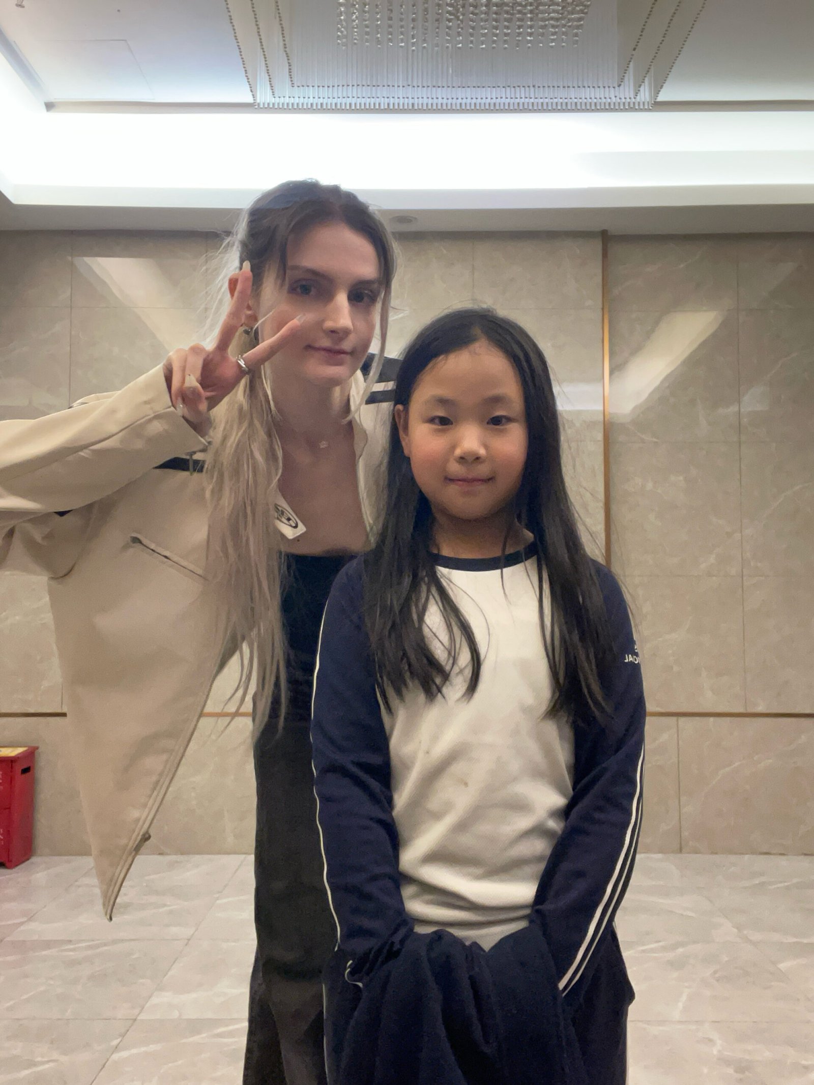 Alice with a child in Chengdu