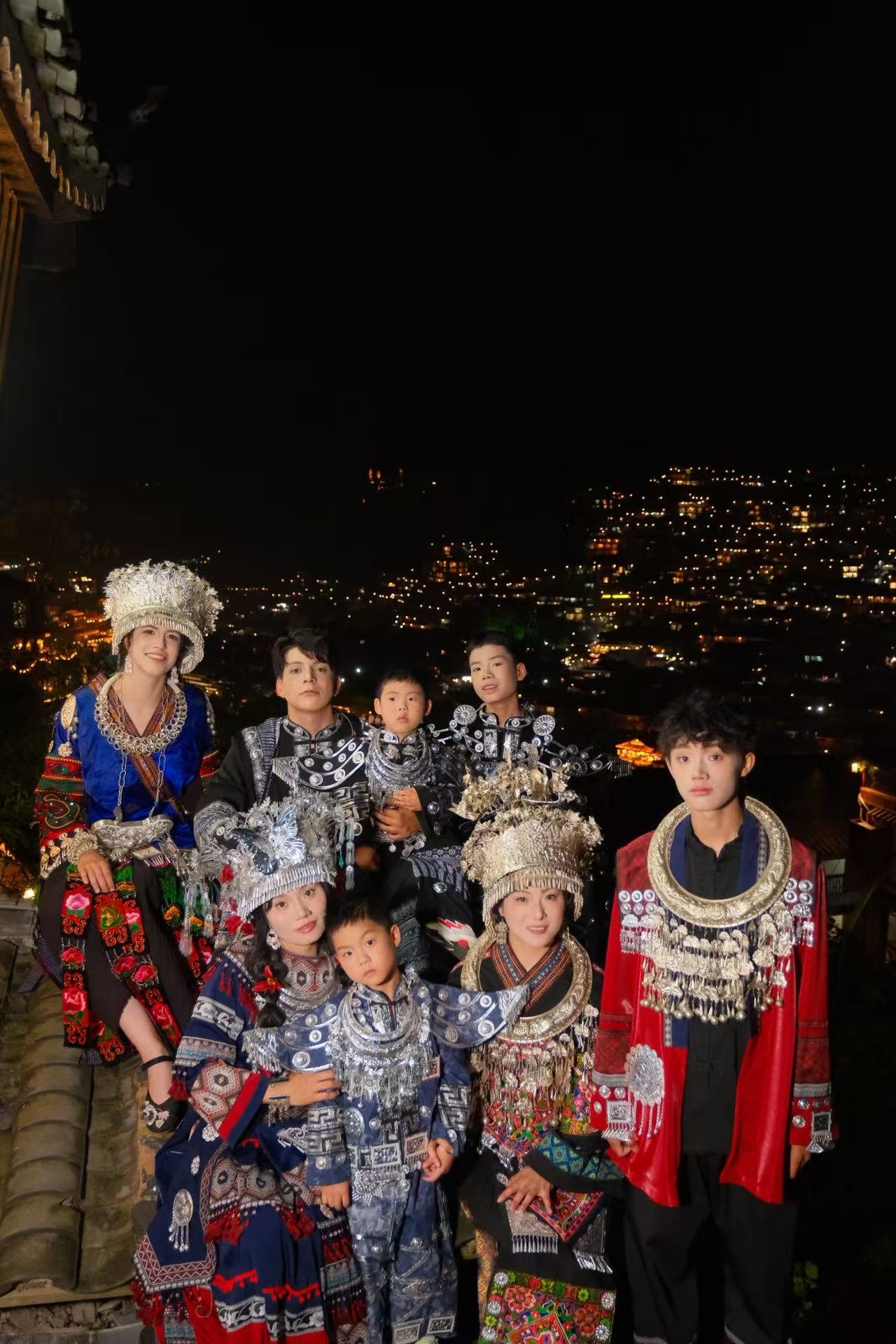 Michele and his host family in traditional Miao costumes